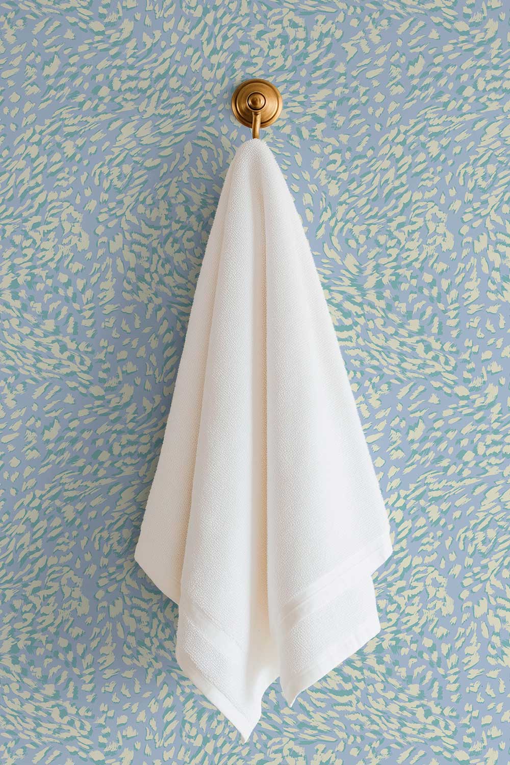 french blue and teal abstract leopard wave print abstract printed on commercial grade water and stain resistant performance vinyl wall-covering, great for bathrooms, kitchens and commercial spaces