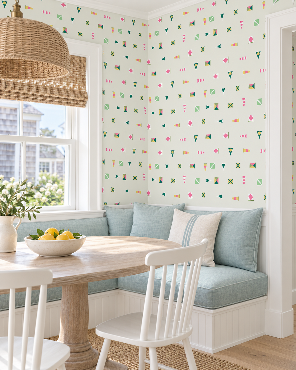 lake house breakfast nook with playful nautical flag sailboat wallpaper