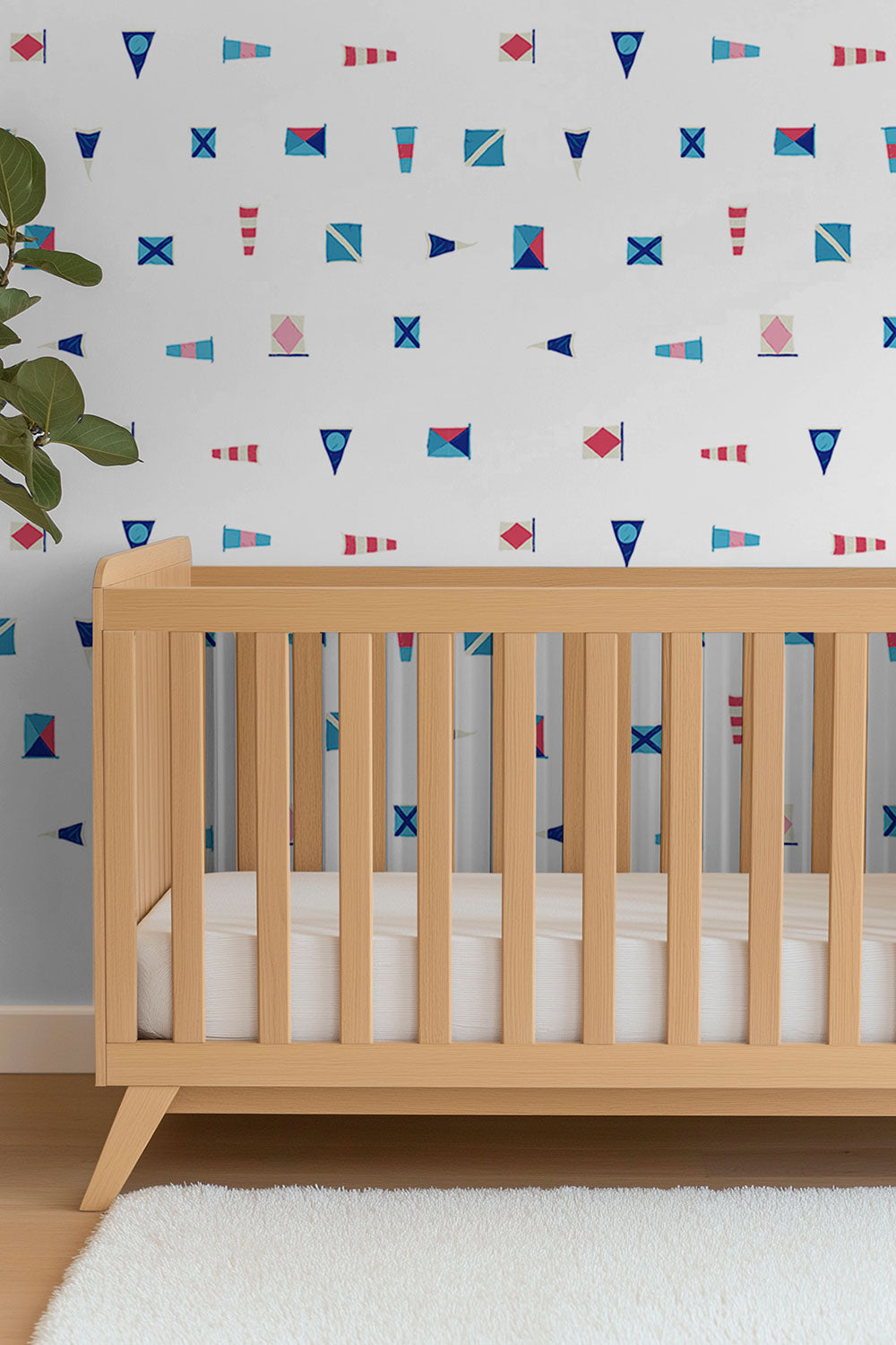 Coastal boathouse wallpaper with playful maritime flags perfect for baby boy nurseries