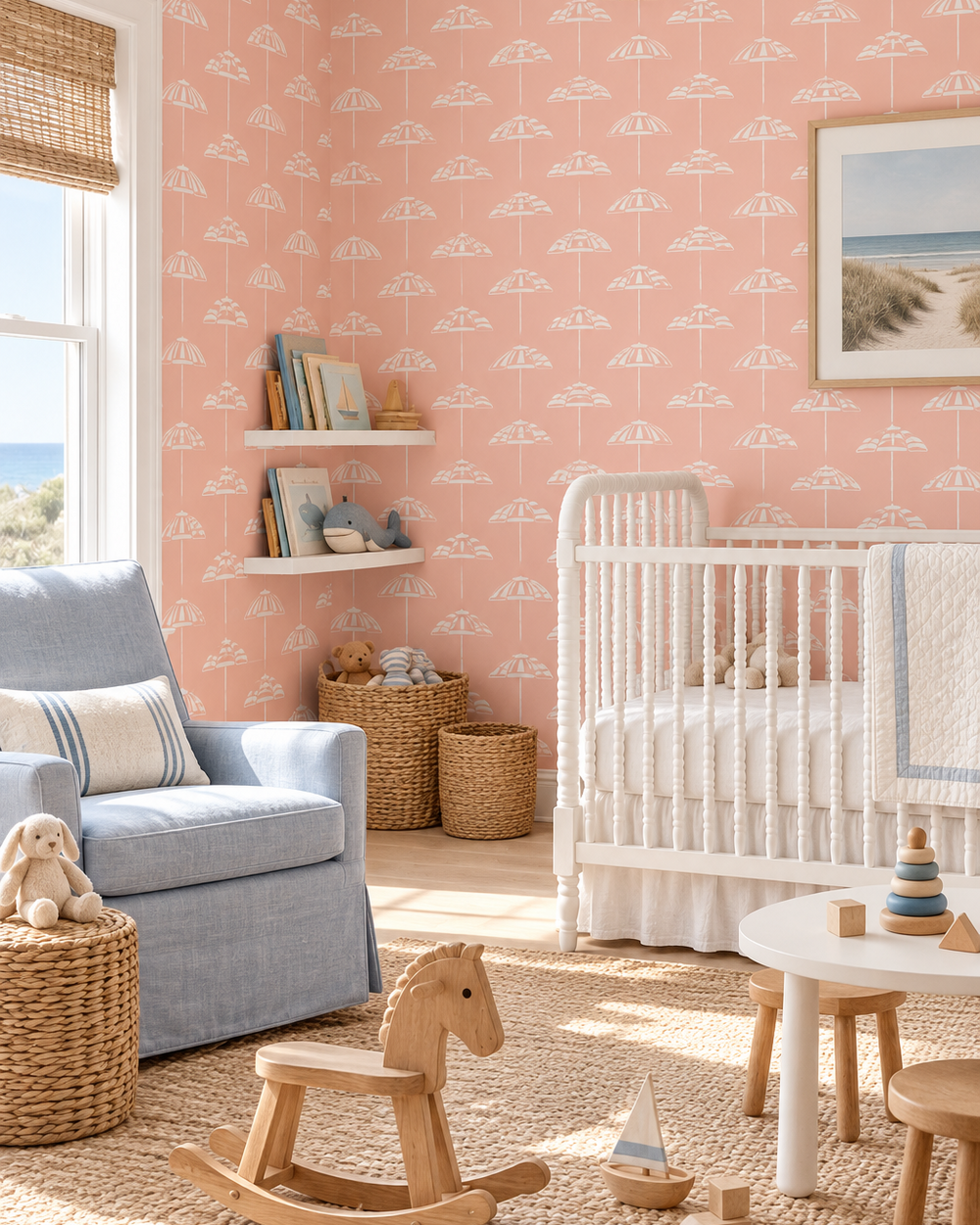 peach pink coastal inspired nursery with traditional matte wallpaper featuring vertical striped hand-painted watercolor beach umbrellas