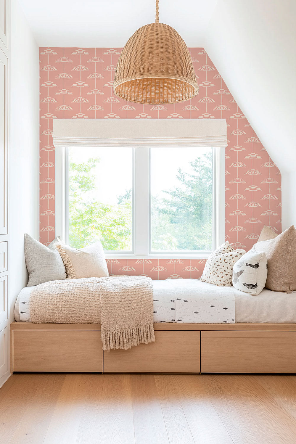 beach house sleeping nook in luxury vacation rental with playful hand-drawn beach umbrella stripe in pink and peach for girls.
