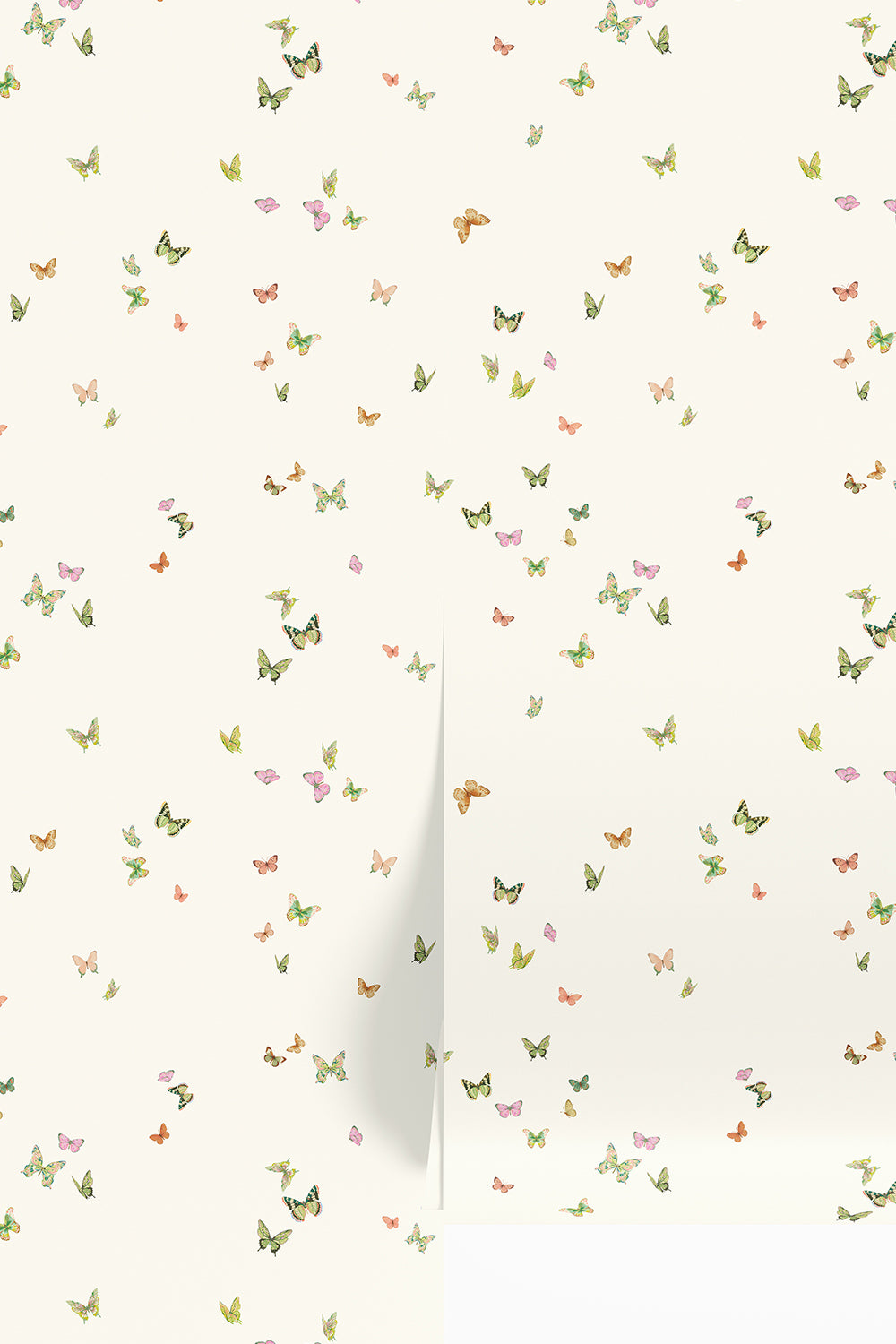 Butterfly Grove wallpaper featuring watercolor-painted butterflies in soft pink, green, and neutral tones inspired by English garden skies printed on a cream colored traditional wall-covering