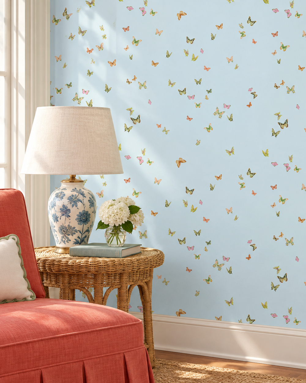 butterfly grove all-natural and eco-friendly grasscloth and basketweave wallpaper features watercolor-painted butterflies in soft blue with green, and neutral tones inspired by English garden skies perfect for inviting living rooms