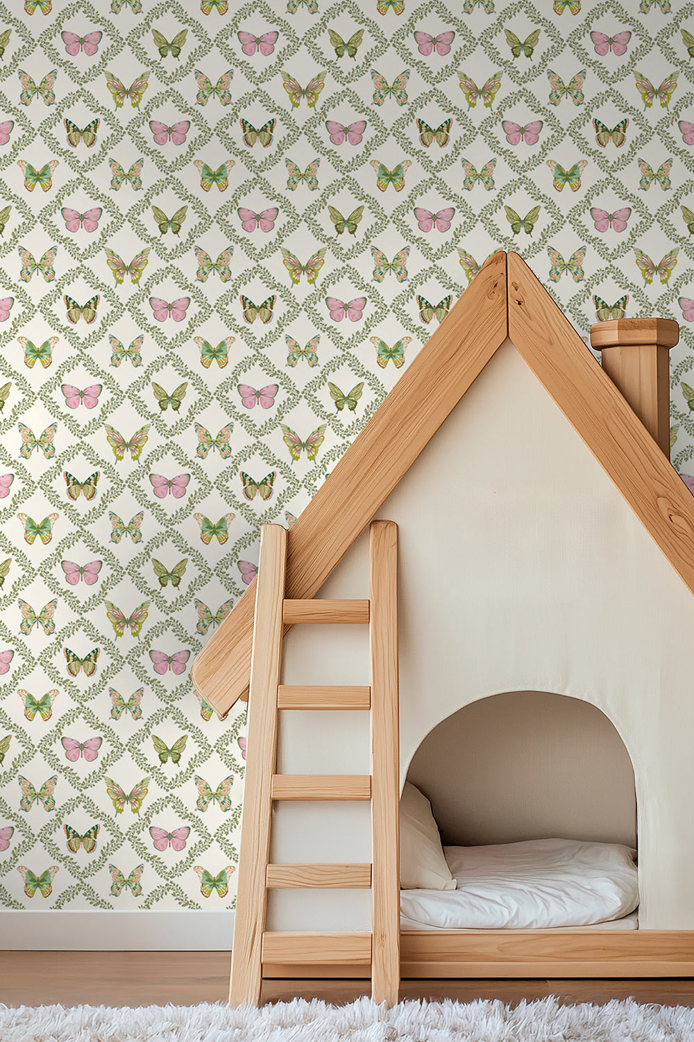 Butterfly Trellis wallpaper featuring hand-painted watercolor butterflies arranged in a leafy green trellis pattern inspired by English gardens perfect for kids playrooms and nurseries