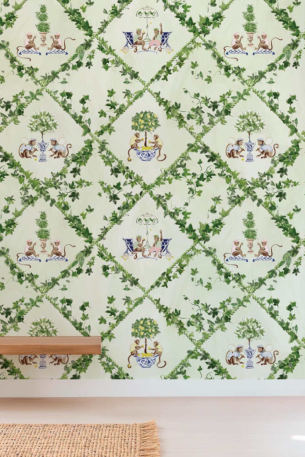 Chinoiserie-style wallpaper featuring hand-painted tennis-playing monkey scenes set within botanical trellis diamonds; ideal for country clubs, tennis spaces, and designer homes.
