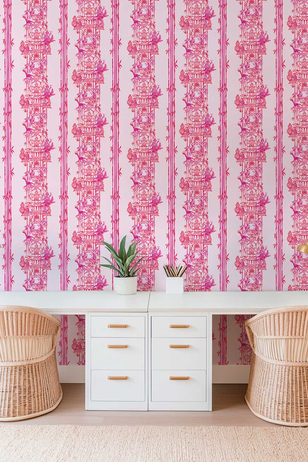 Hand-painted chinoiserie toile wallpaper featuring monkeys partying in pagodas, bamboo stripe details, and classic chintz-inspired motifs; shown in pink colorways perfect for luxury home offices for interior designers