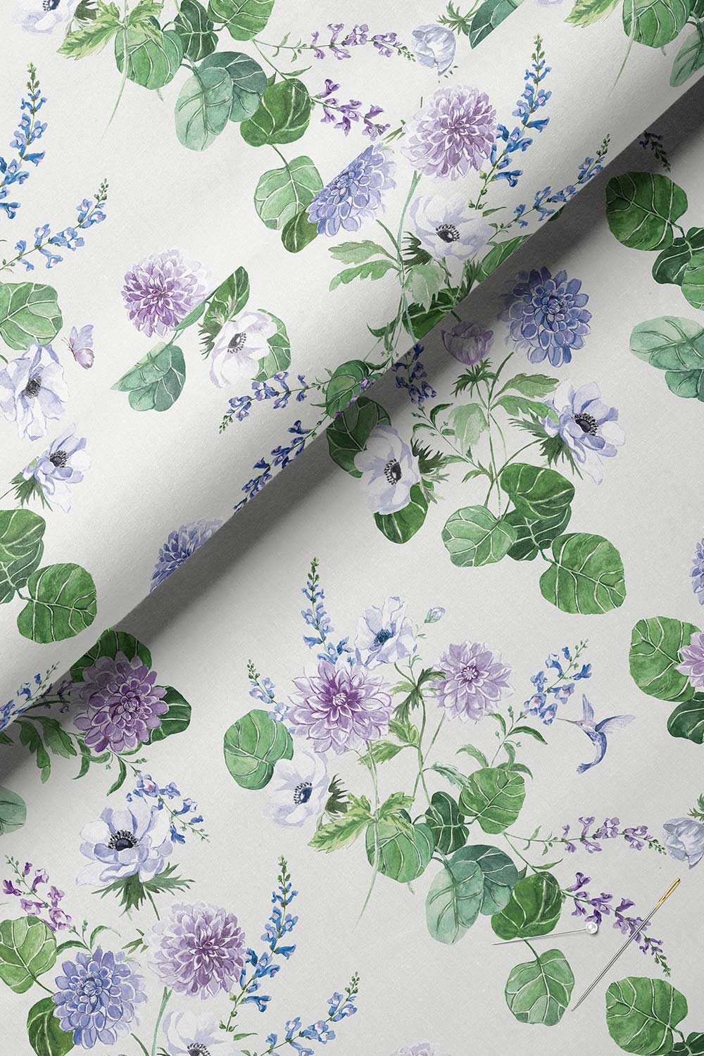 Botanical floral upholstery fabric with hand-painted dahlias, snapdragons, and hummingbirds in a vibrant, garden-inspired layout.