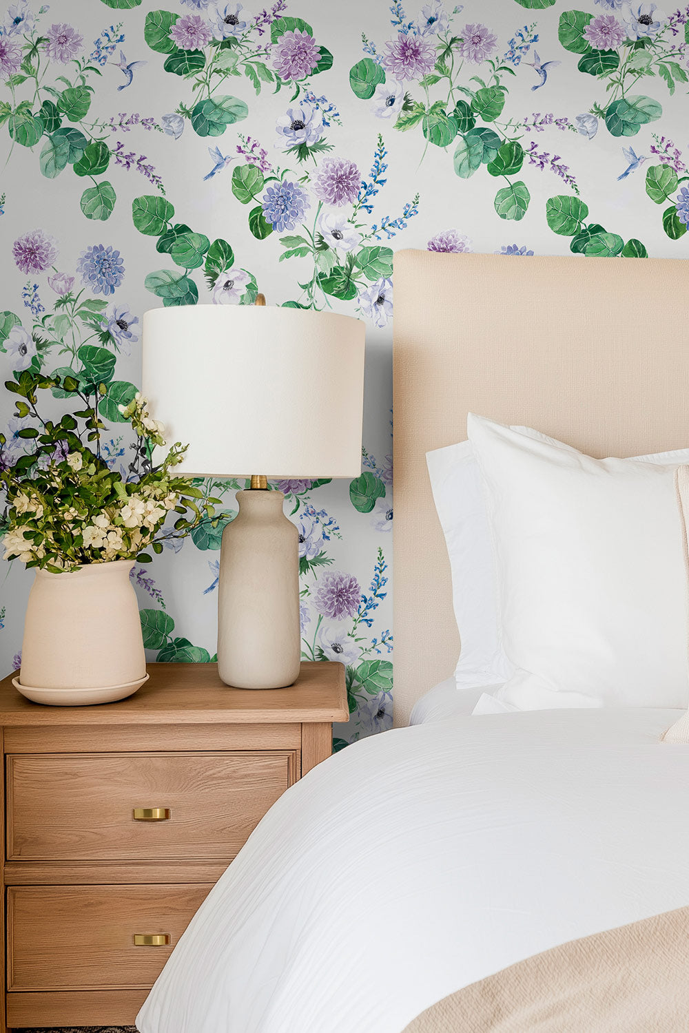 Chirp Society Garden wallpaper with lilac, purple and green hand-painted dahlias, scabiosa, snapdragons, and hummingbirds in a vibrant watercolor botanical design perfect for calming guest bedrooms and master suites