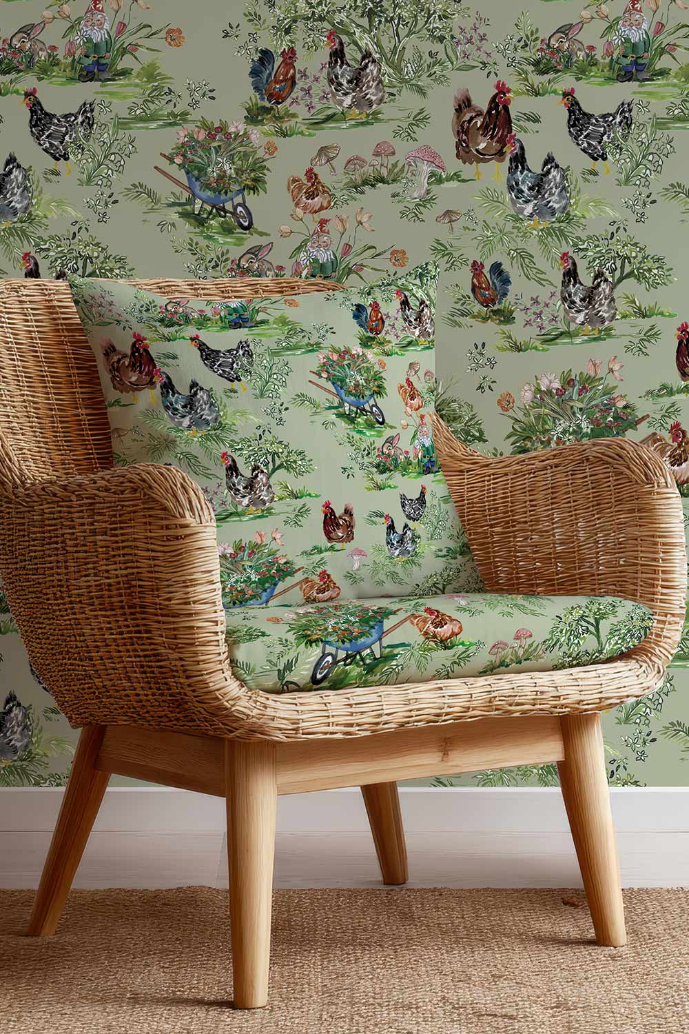 Playful farmhouse toile upholstery fabric with hand-painted chickens, bunnies, mushrooms, and garden motifs in a classic toile layout.