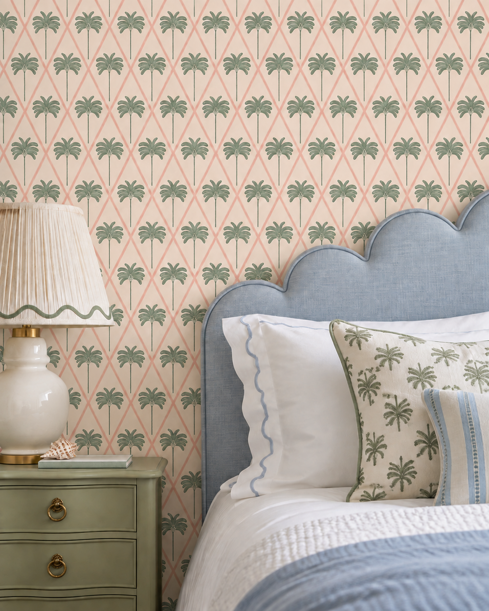 interior designed luxury master bedroom suite with coastal pink palm tree wallpaper in lattice design