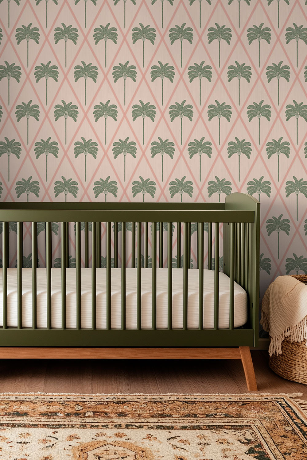 interior designed baby girl nursery with coastal pink palm tree wallpaper in lattice design