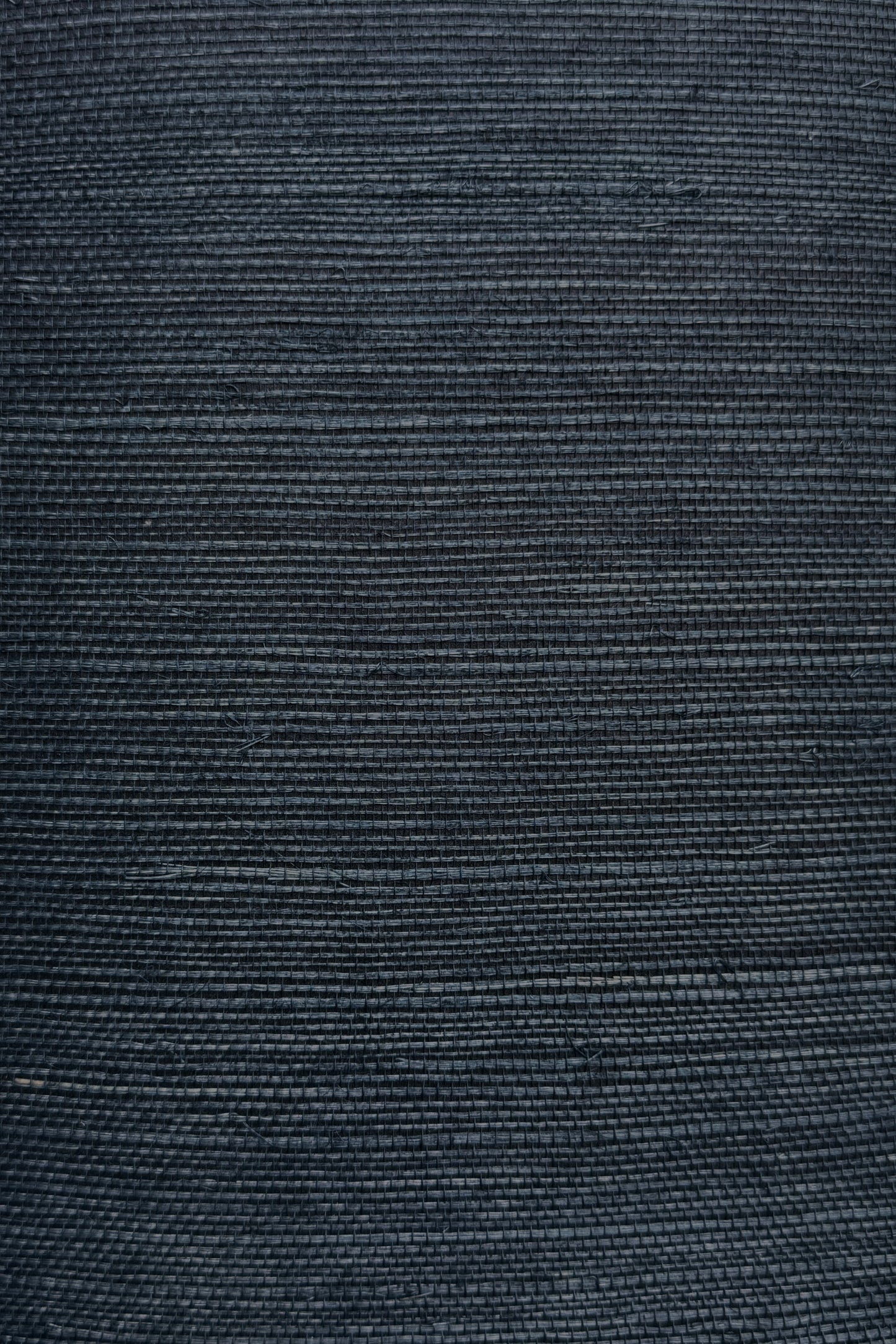 Deep navy woven sisal grasscloth wallpaper texture