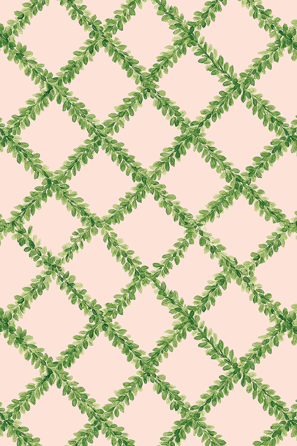 Ivy Trellis grasscloth wallpaper featuring hand-painted green leafy diamonds on a pastel pink woven natural fiber surface