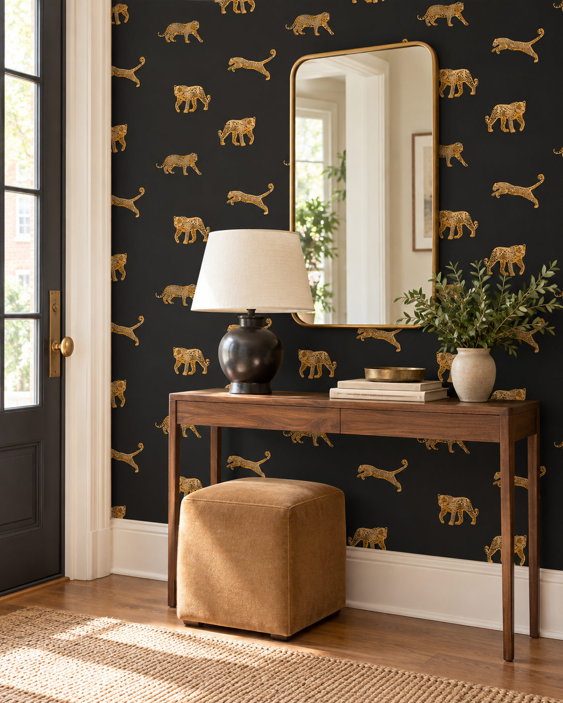 dramatic home entrance with grasscloth printed black wallpaper with cheetahs