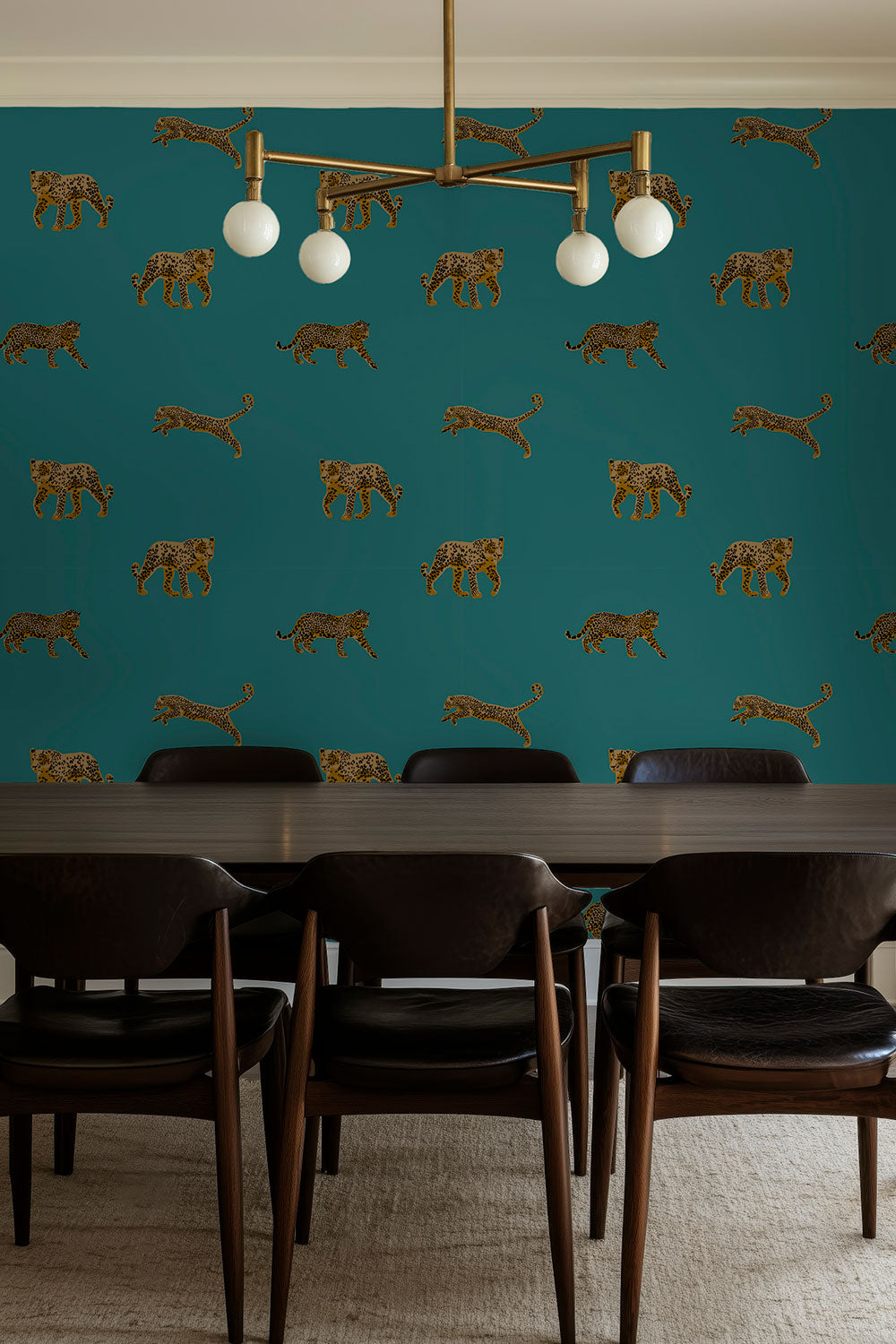 luxury city chic and modern dining room with bold animal print jungle leopard wallpaper on green all-natural and eco-friendly grass cloth