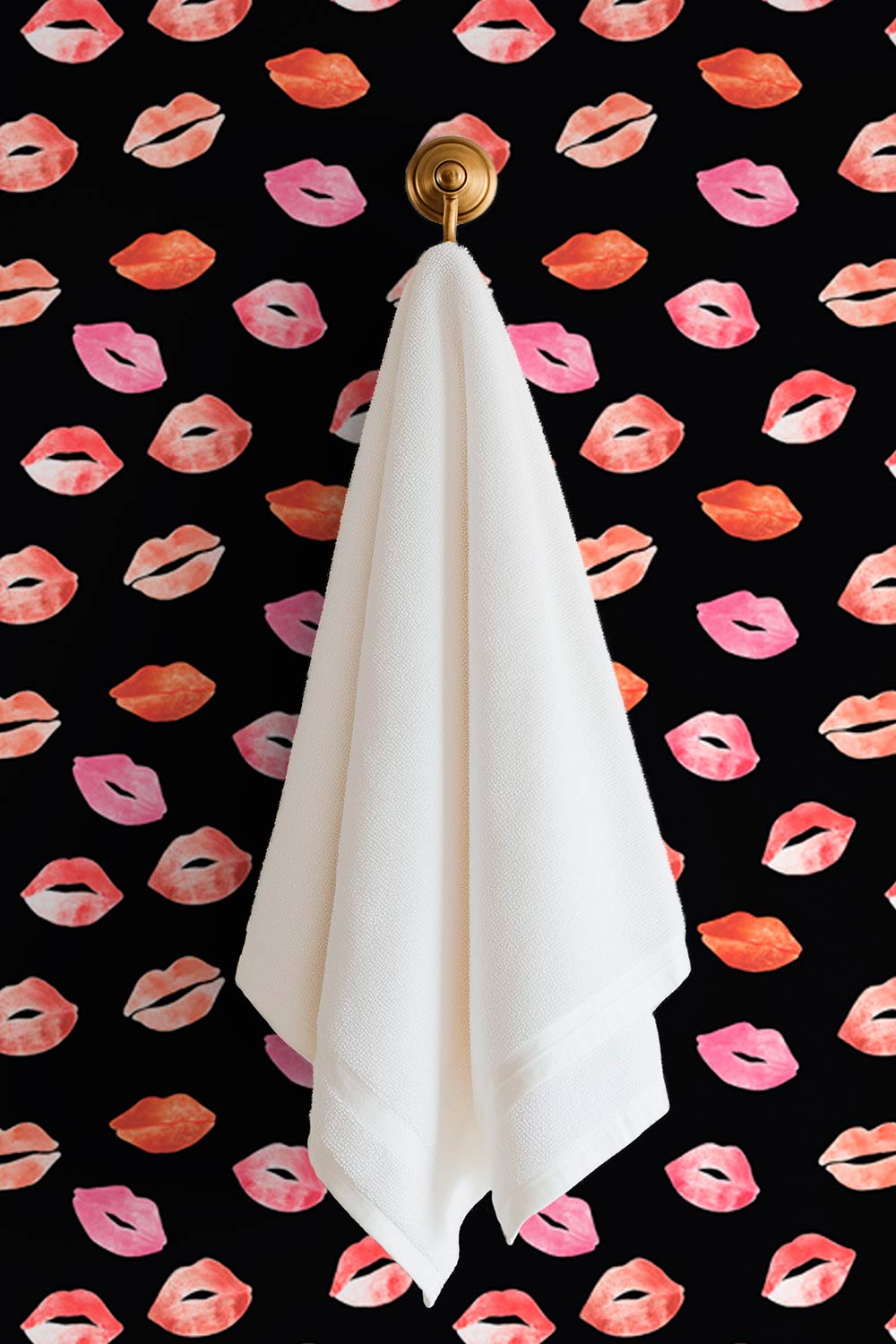 Durable textured vinyl wallpaper with repeating watercolor lipstick kiss marks in pink and red hues for bathrooms, girl's bedrooms, and beauty salons and makeup studios
