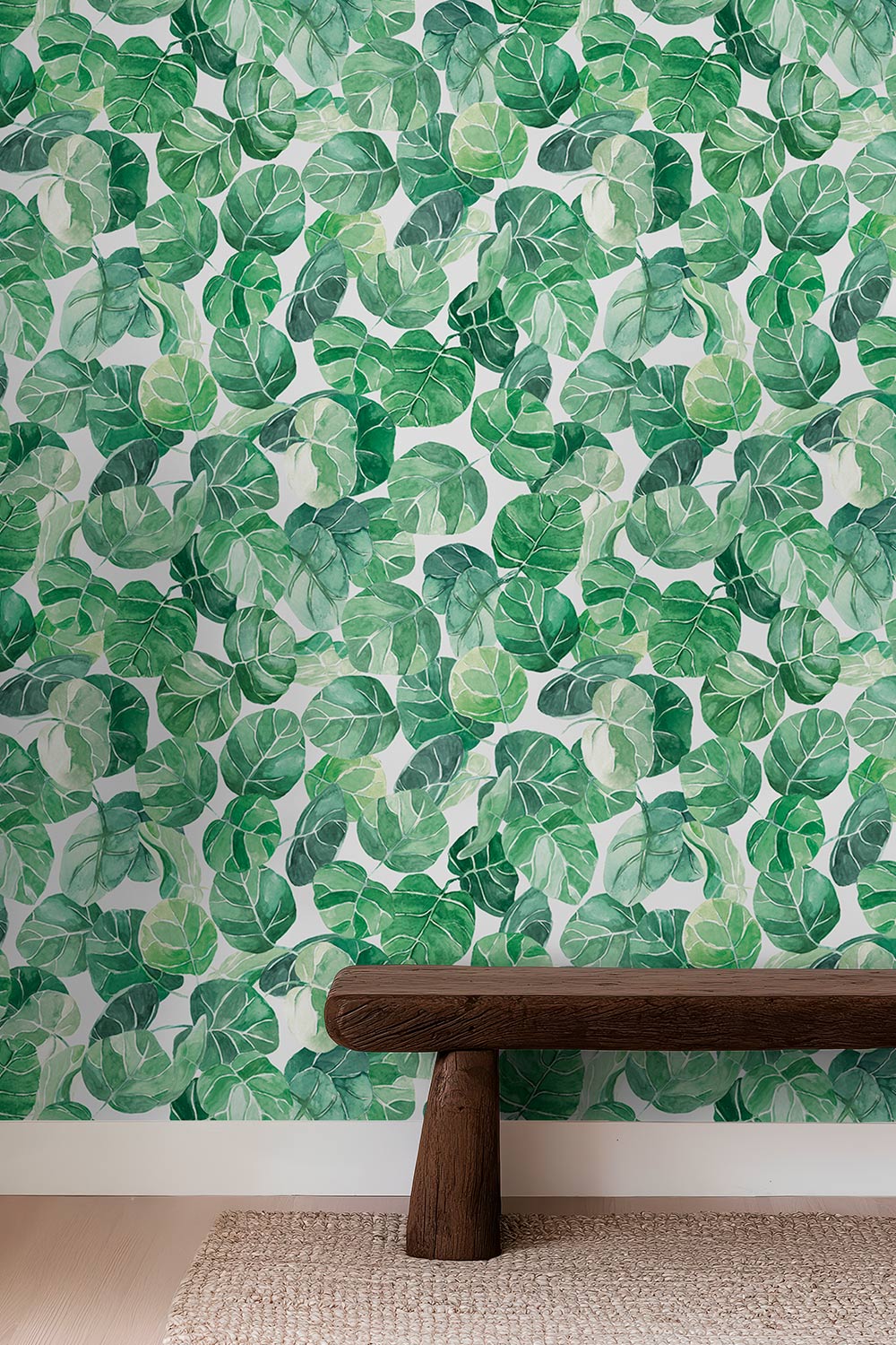 Textured performance vinyl wallpaper featuring large-scale watercolor tropical leaves in layered greens, available in multiple coastal base colors.
