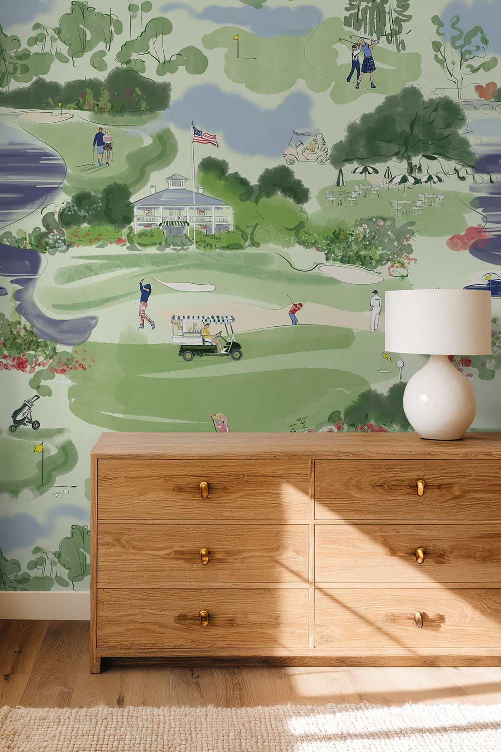 Golf Course Toile removable peel and stick wallpaper in Mulligan Moss featuring golfers, putting greens, fairways, golf carts, water hazards and a clubhouse.