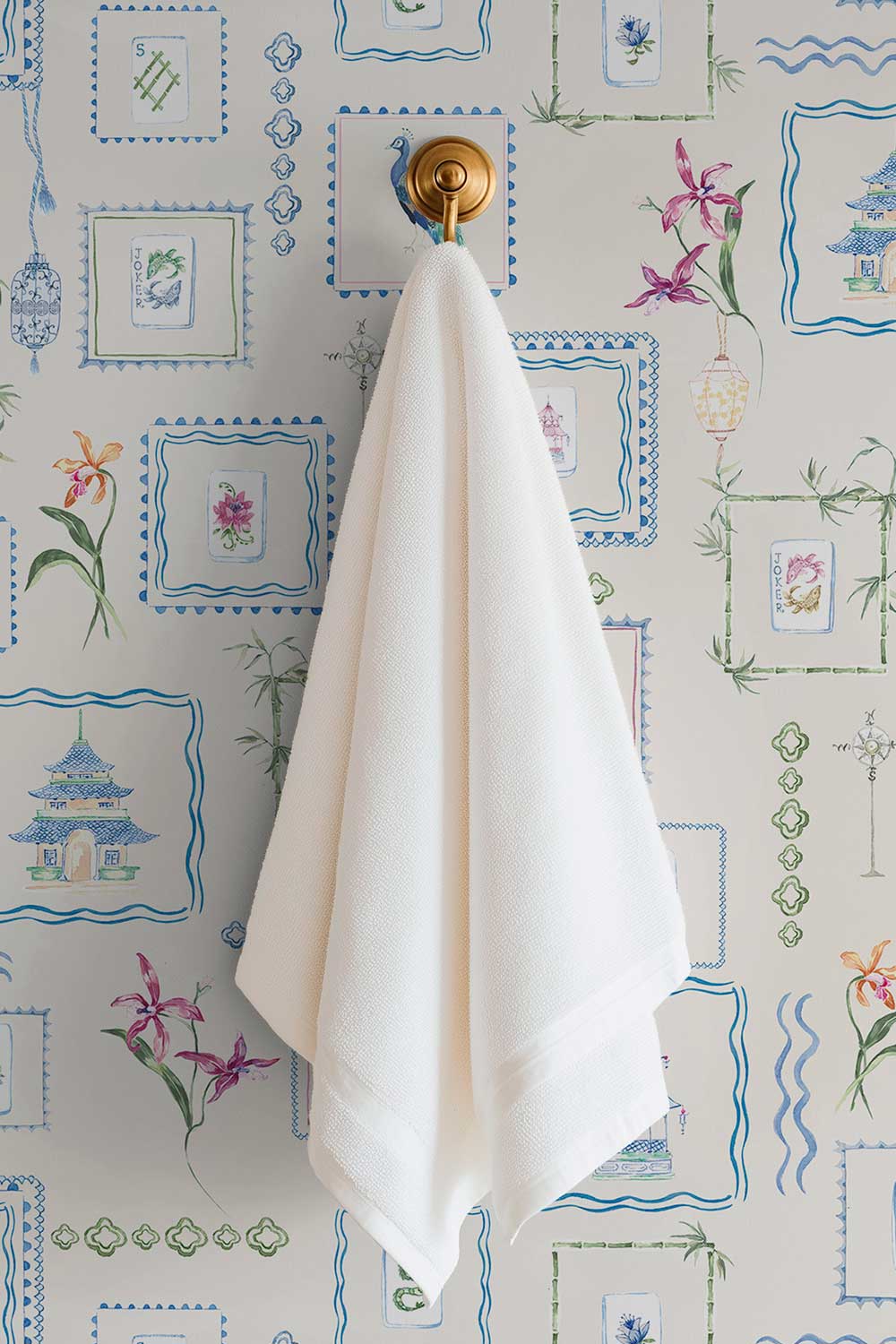 Washable performance vinyl Mahjong Tiles wallpaper with hand-painted chinoiserie details, perfect for powder rooms, bathrooms, game rooms, and clubs.