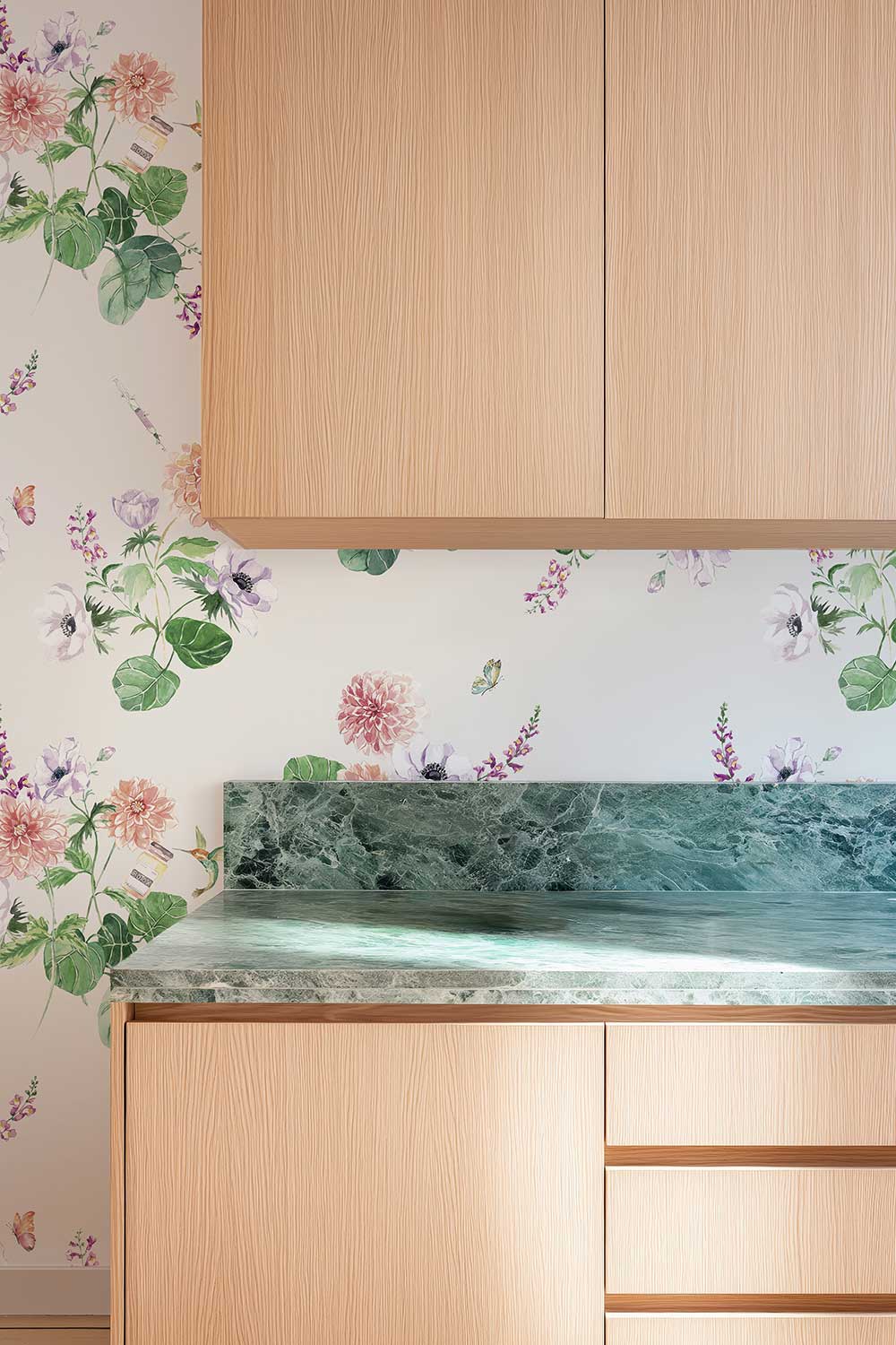 Walltox botanical peel and stick wallpaper featuring watercolor dahlias, anemones, tropical green leaves, hummingbirds, butterflies and playful Botox bottles.
