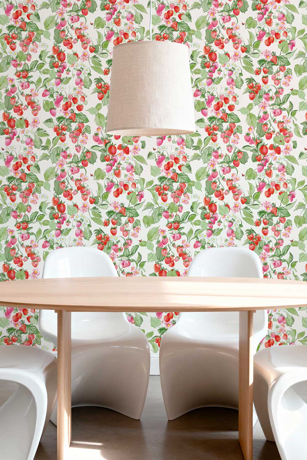 Strawberry Fields removable peel and stick wallpaper in Sun-Ripened Red featuring watercolor red and pink strawberries, blossoms, green leaves and tiny ladybugs.
