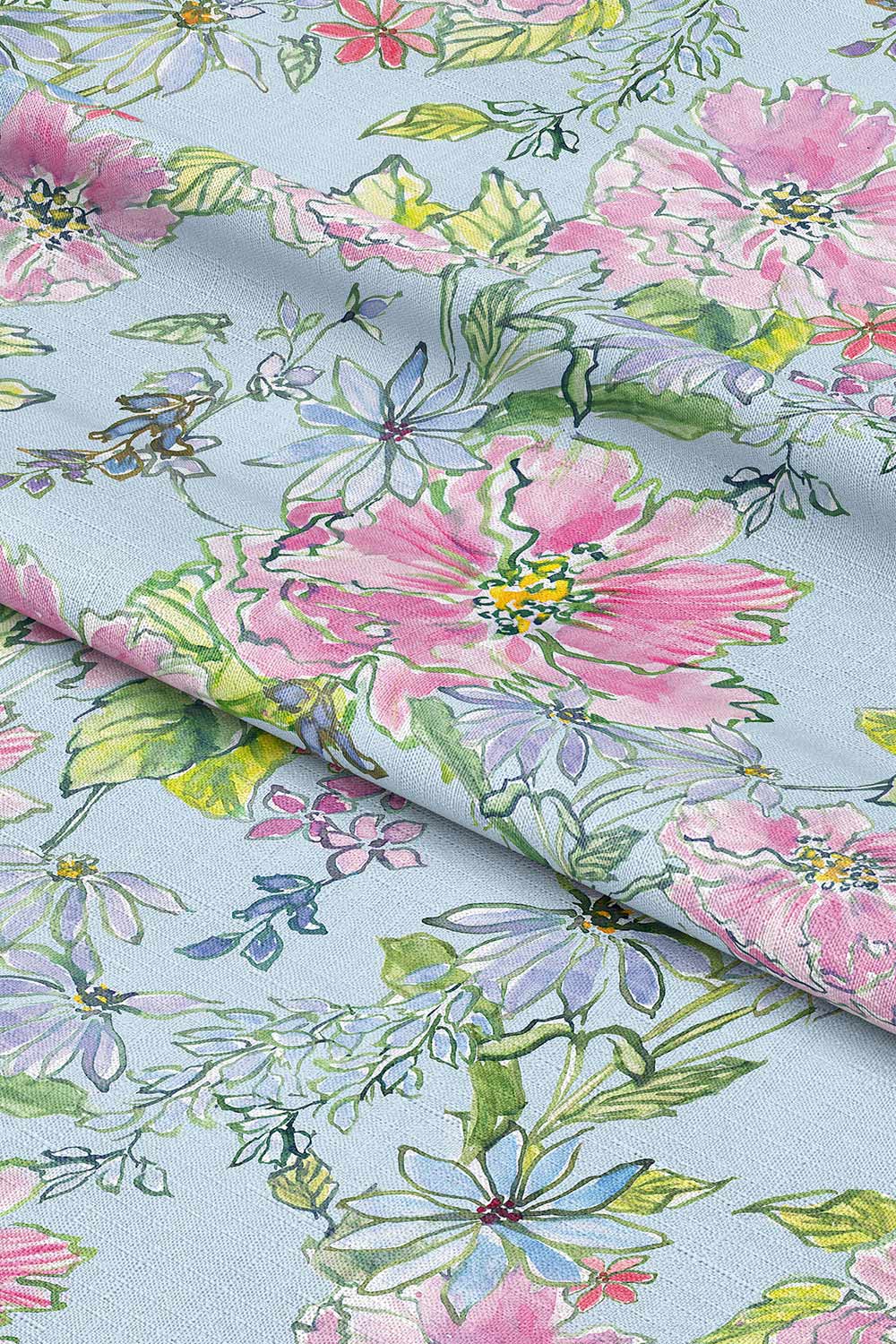 Romantic botanical upholstery fabric featuring hand-painted watercolor florals arranged like a loose garden bouquet with soft, airy movement.