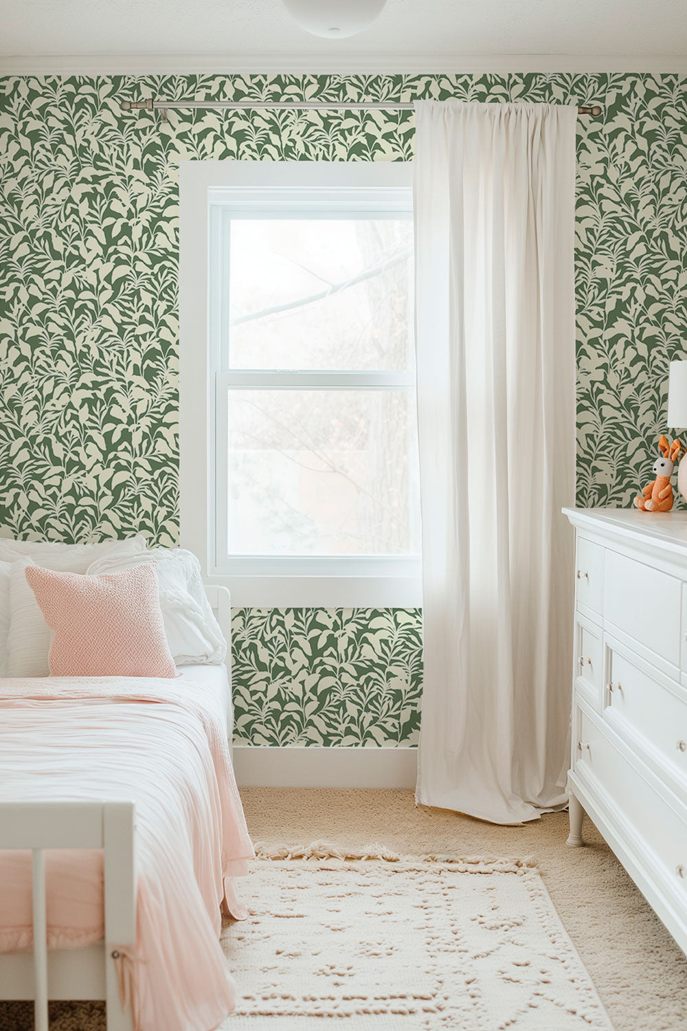 Bold botanical green and white garden wallpaper with palm fronds for playful kids’ rooms and cottages