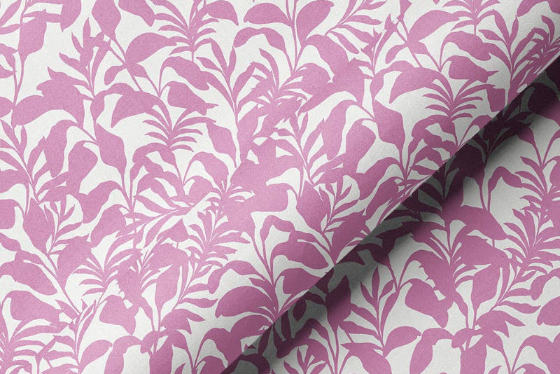 Bold tropical upholstery fabric featuring oversized palm frond leaves in a dynamic, statement-making pattern.