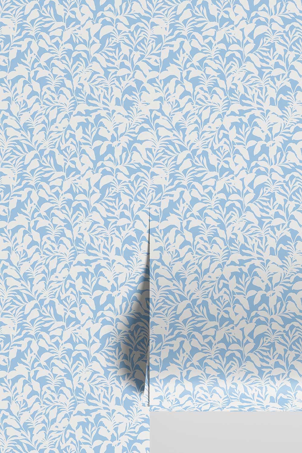 Palm Frond & Found wallpaper with bold botanical palm leaf pattern in blue and cream