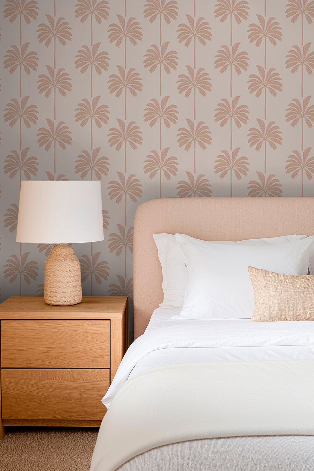 luxury guest bedroom in beach vacation house with peaceful palmetto striped wallpaper in coastal pink and peach neutral