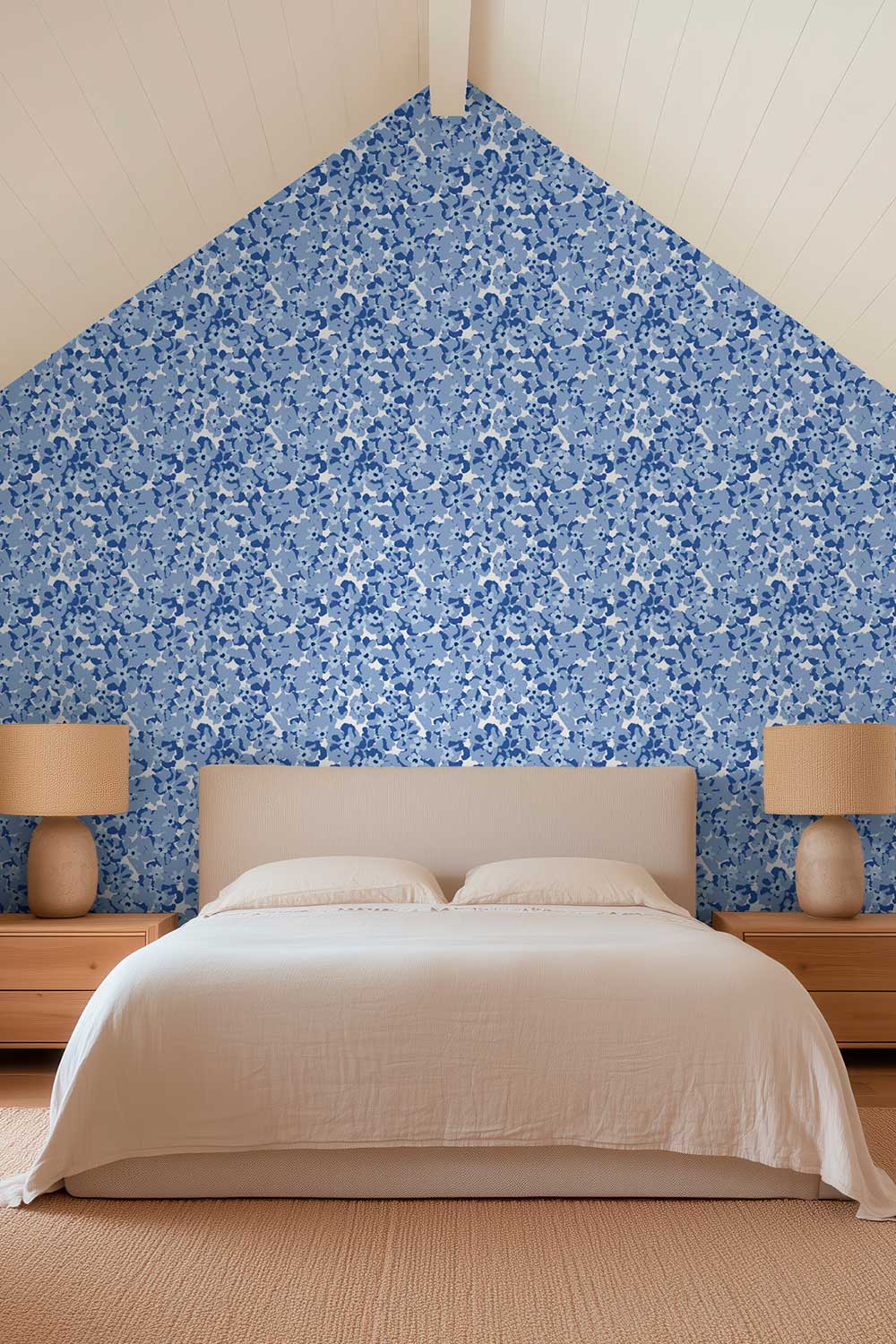 Petal Pusher floral garden wallpaper in soft blue pastel tones for cozy guest bedrooms
