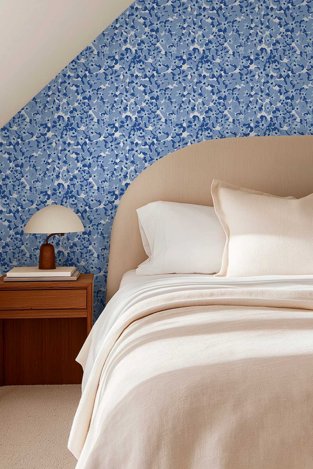 cozy cottage guest bedroom with vintage inspired blue floral design printed on luxurious all-natural grass cloth wall-covering