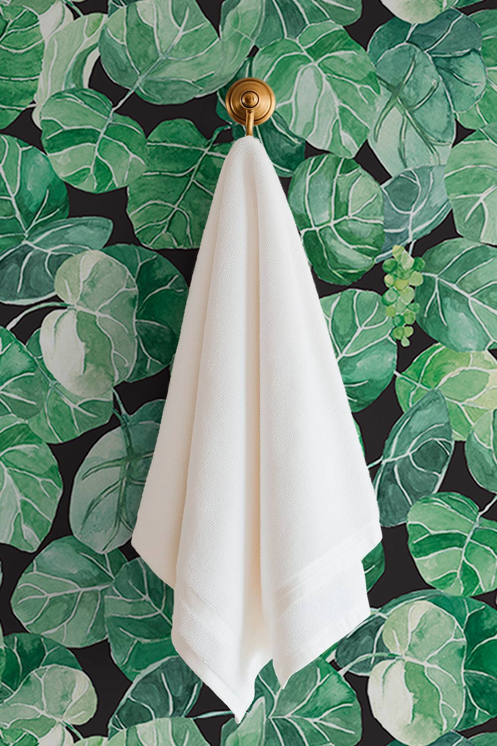 Durable performance vinyl wallpaper featuring watercolor seagrape leaves and green botanical clusters, ideal for coastal rentals, bathrooms, and high-use spaces.