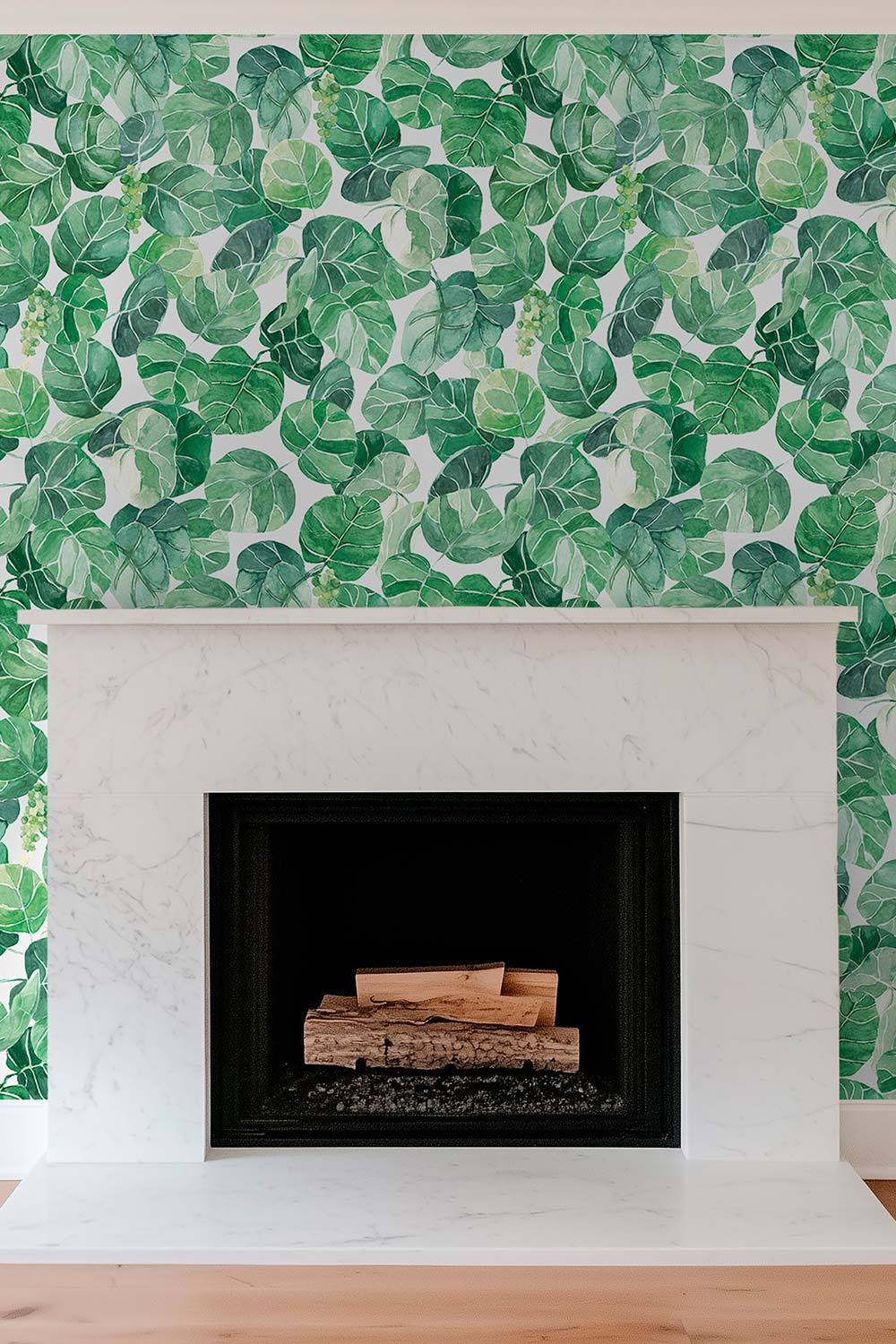Hand-painted watercolor seagrape leaves printed on natural woven grasscloth, featuring layered green foliage and soft fruit clusters in a coastal botanical style perfect for luxury beach house living rooms