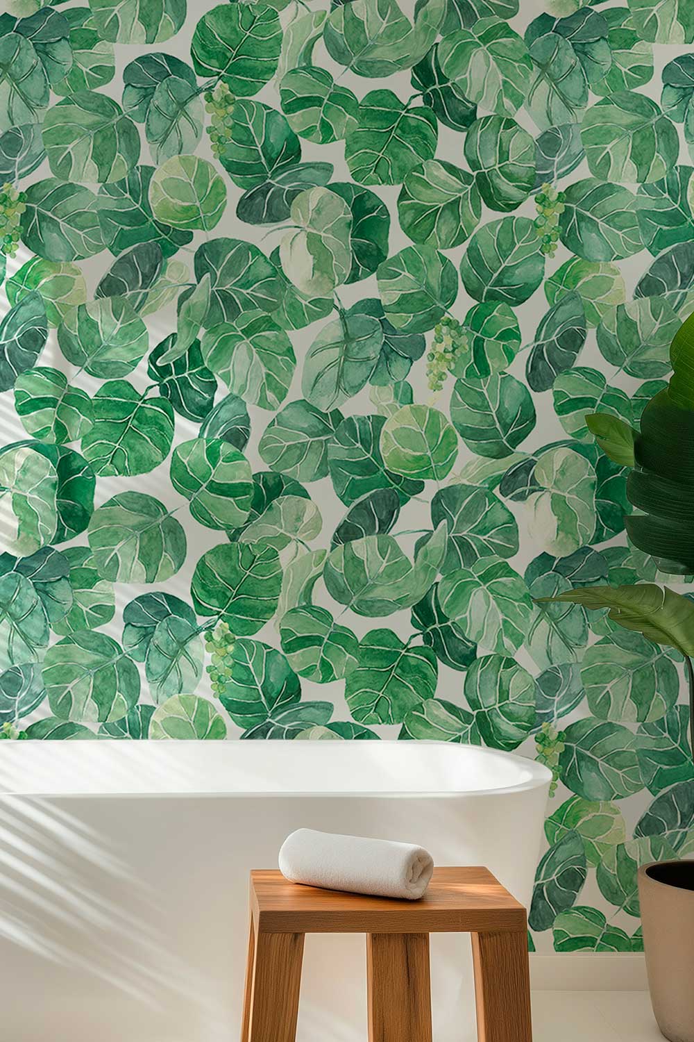 Durable performance vinyl wallpaper featuring watercolor seagrape leaves and green botanical clusters, ideal for coastal rentals, bathrooms, and high-use spaces.
