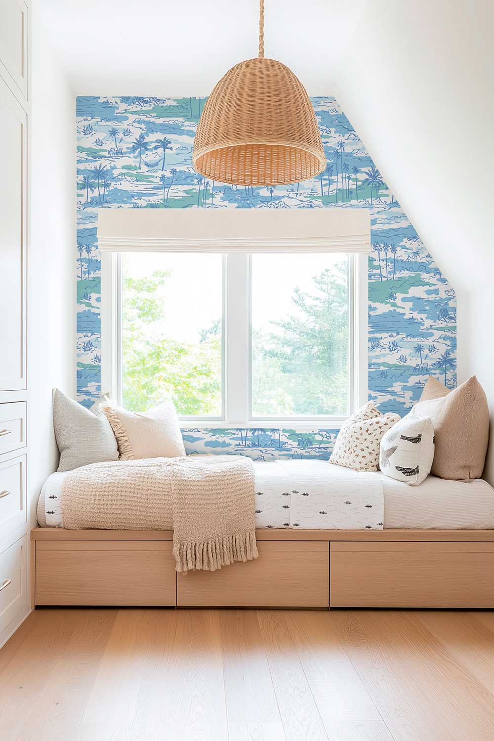 coastal kids room with modern beach toile wallpaper in ocean blues