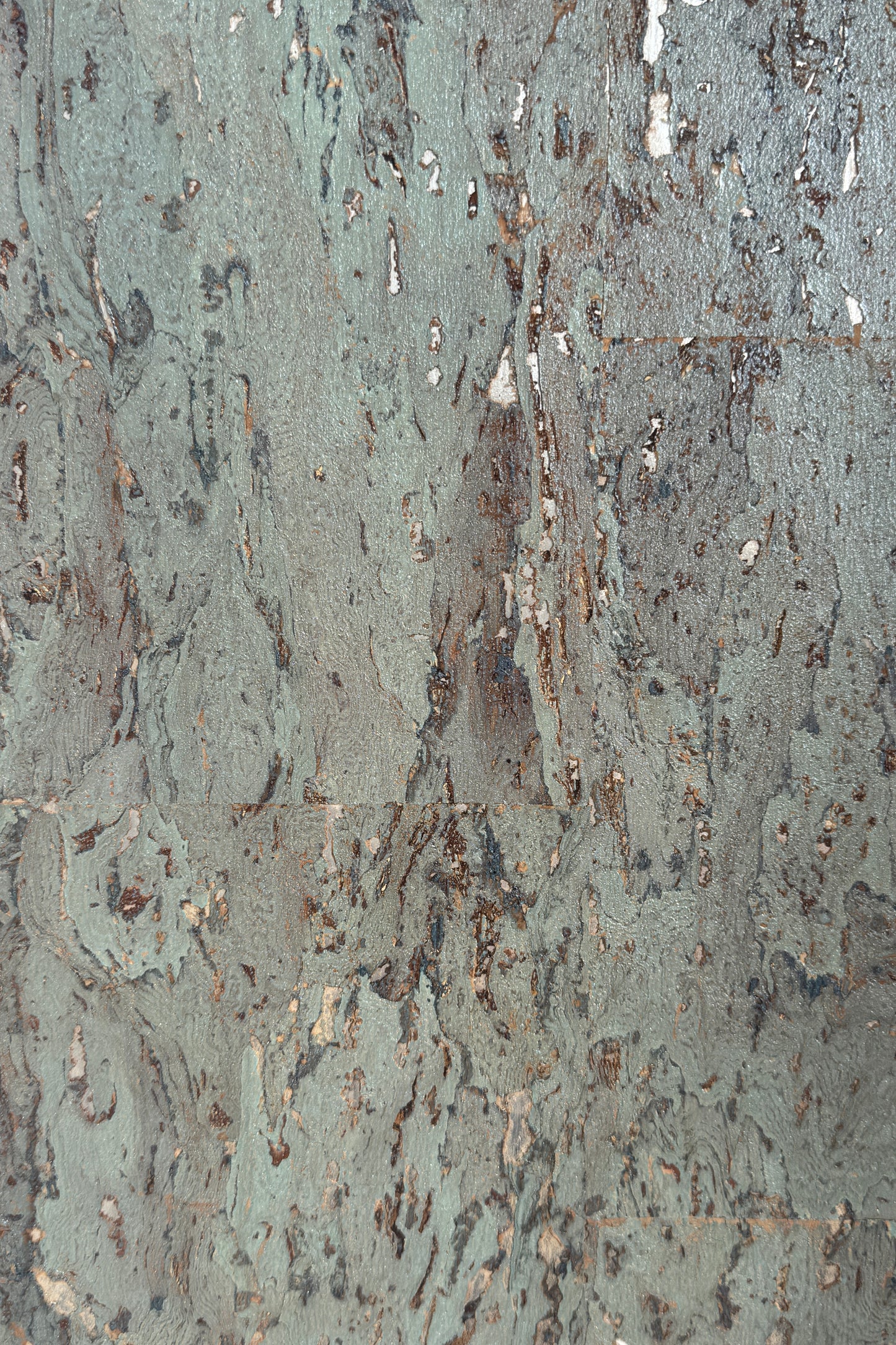 Pale Green with shimmer Cork Wallpaper — close-up of soft green cork wallpaper with natural, organic texture and metallic speckling on silver metallic