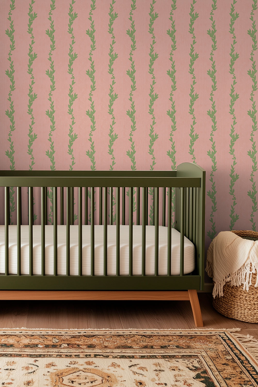 Peaceful botanical wallpaper with leafy vines arranged in vertical stripes for baby girl nursery in pink and green