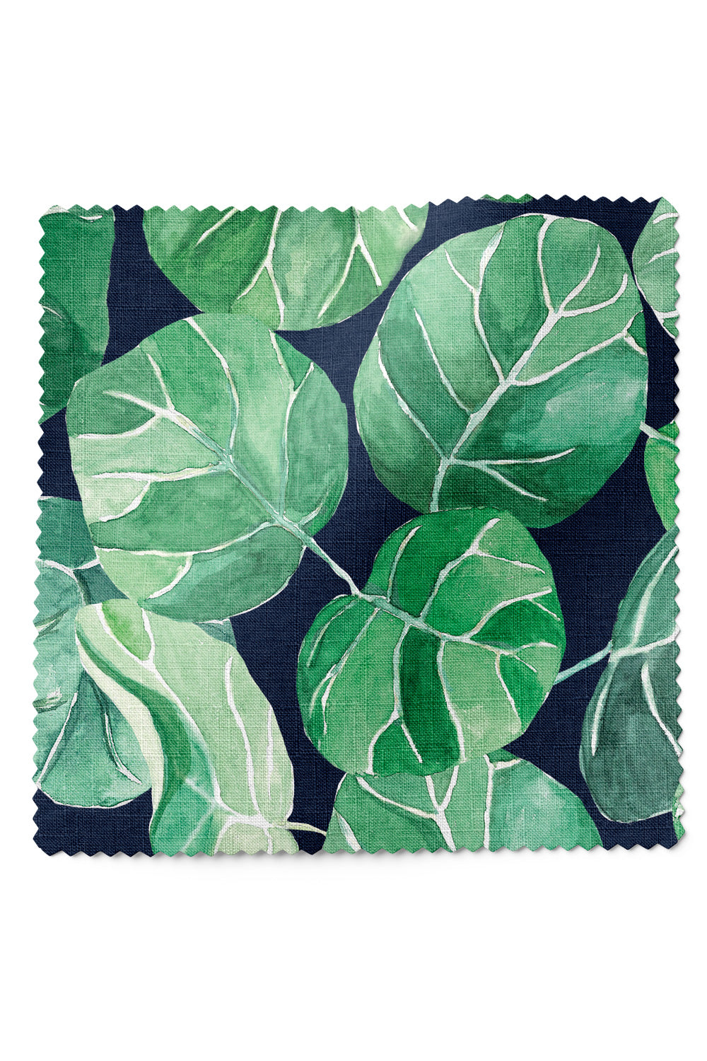 Tropical botanical upholstery fabric with large-scale hand-painted watercolor leaves in layered shades of green, inspired by coastal landscapes on navy ground.