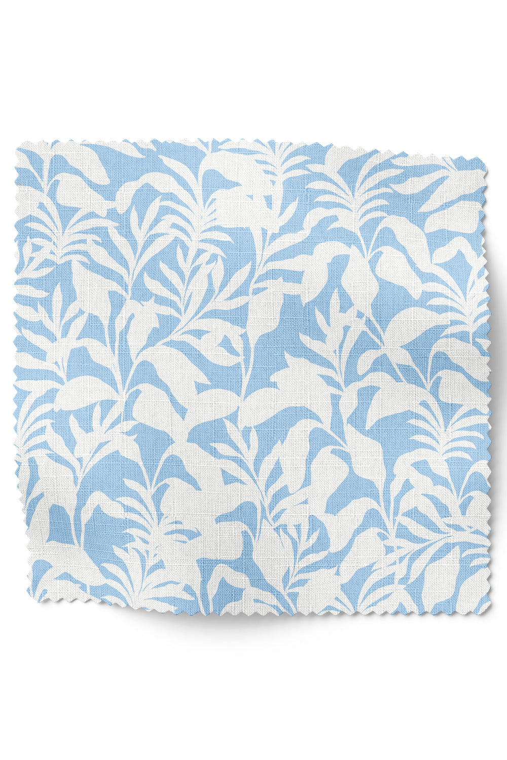 Bold tropical upholstery fabric featuring oversized palm frond leaves in a dynamic, statement-making pattern.