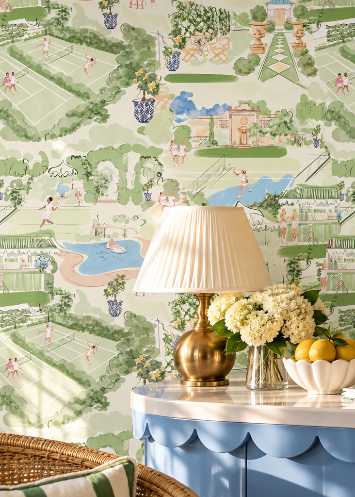 Tennis Club Toile performance vinyl wallpaper with illustrated tennis courts, gardens, poolside scenes, and cabana details on a textured washable surface