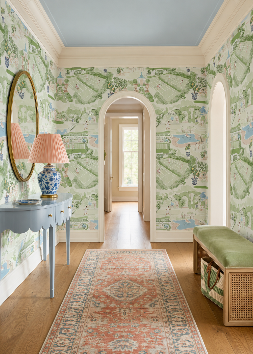 Tennis Club Toile traditional wallpaper featuring hand-drawn country club scenes including tennis matches, gardens, poolside lounging, and cabana moments printed on elevated wall coverings
