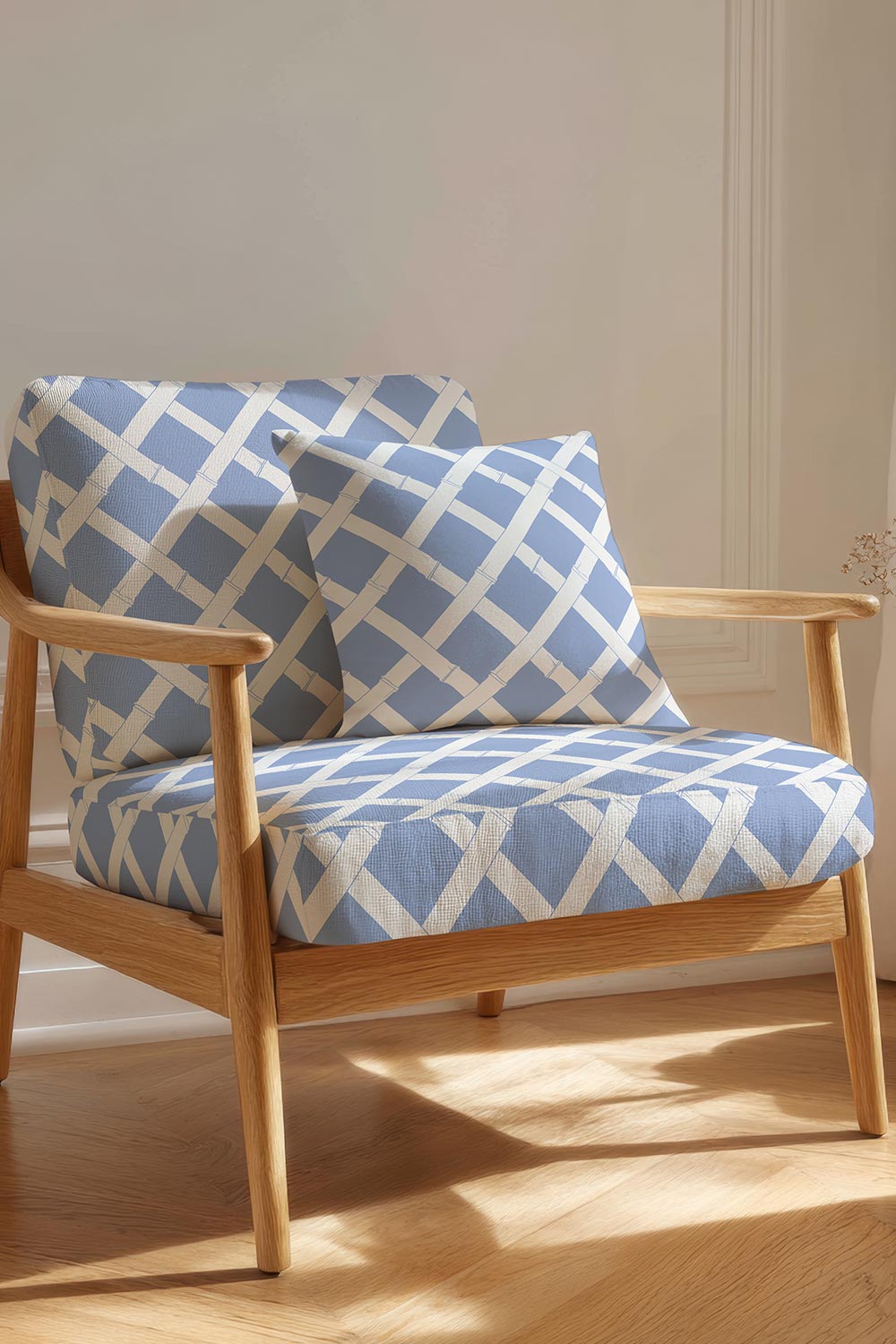 Geometric trellis upholstery fabric inspired by classic garden structures, featuring a balanced, stripe-like layout in french blue and white.