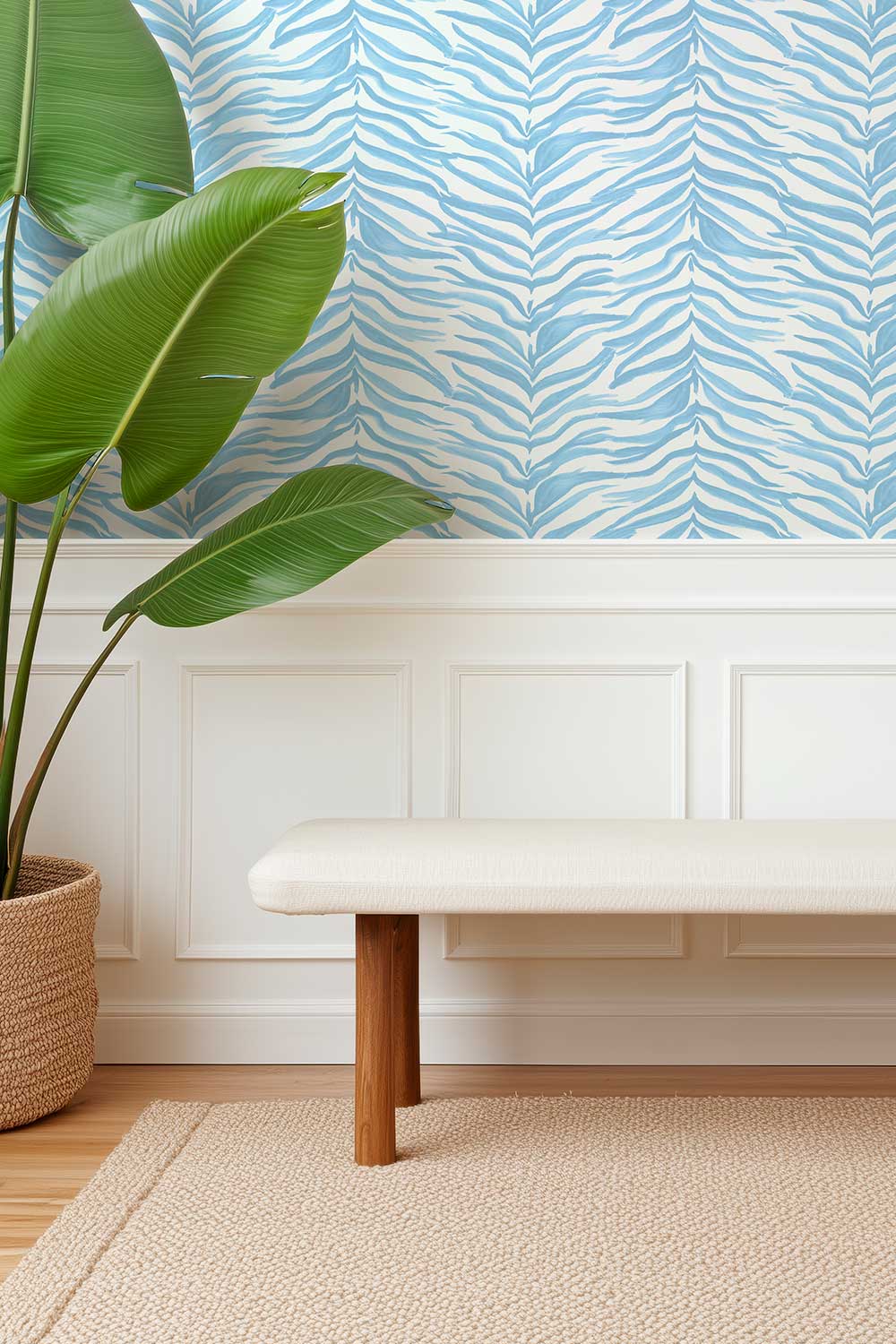 welcoming foyer with calming blue and white watercolor striped wallpaper